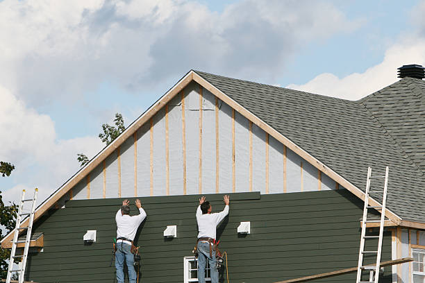 Professional Vinyl Siding technician working in East Freedom, PA